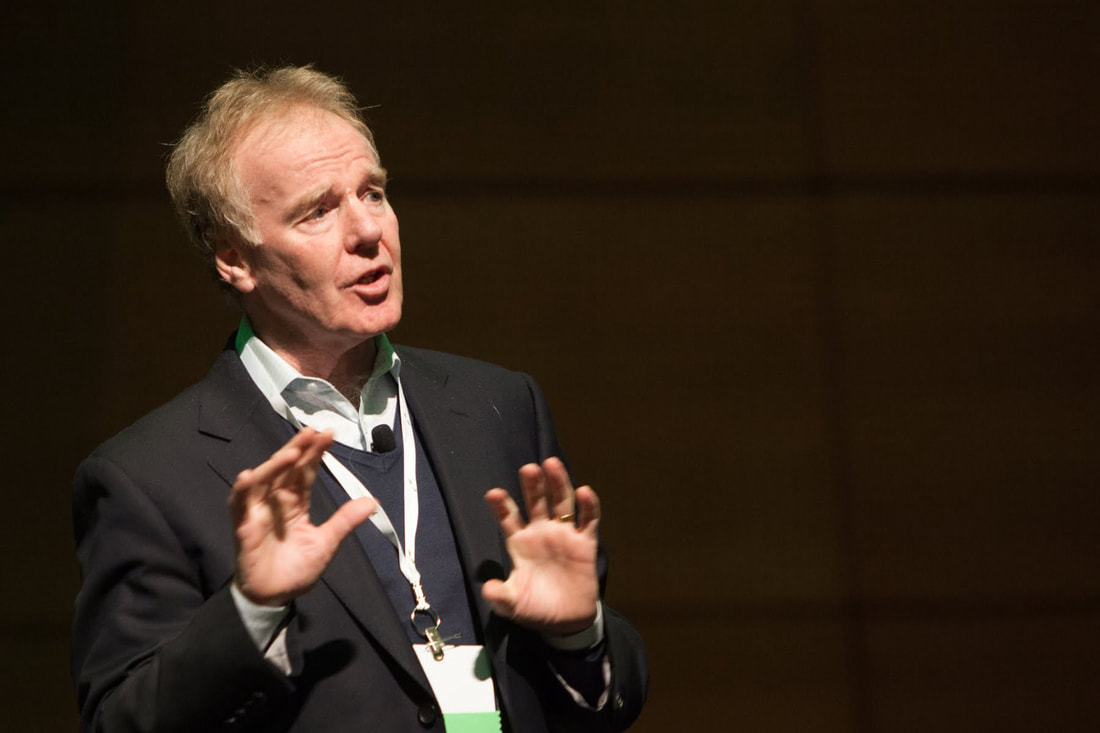 Peter Senge speaking, close up shot